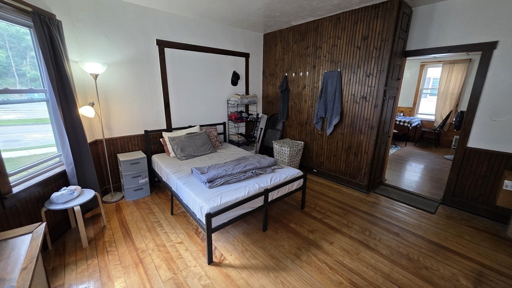 360 Hamilton Street Worcester, MA 01604 - Photo 15 of 35 a living room with furniture and a wooden floor