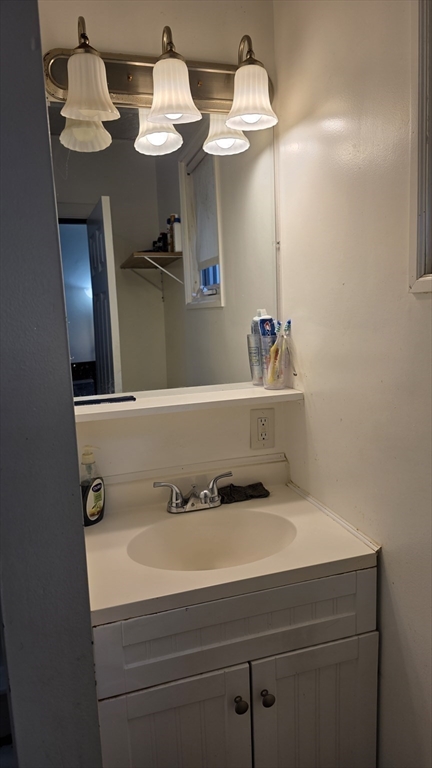 360 Hamilton Street Worcester, MA 01604 - Photo 17 of 35 a bathroom with a sink and a mirror