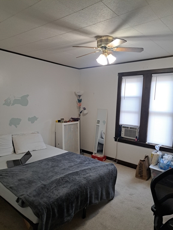 360 Hamilton Street Worcester, MA 01604 - Photo 22 of 35 a bedroom with a bed and a chandelier