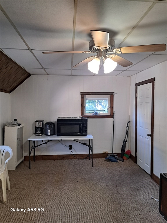 360 Hamilton Street Worcester, MA 01604 - Photo 23 of 35 a living room with furniture a chandelier and a flat screen tv
