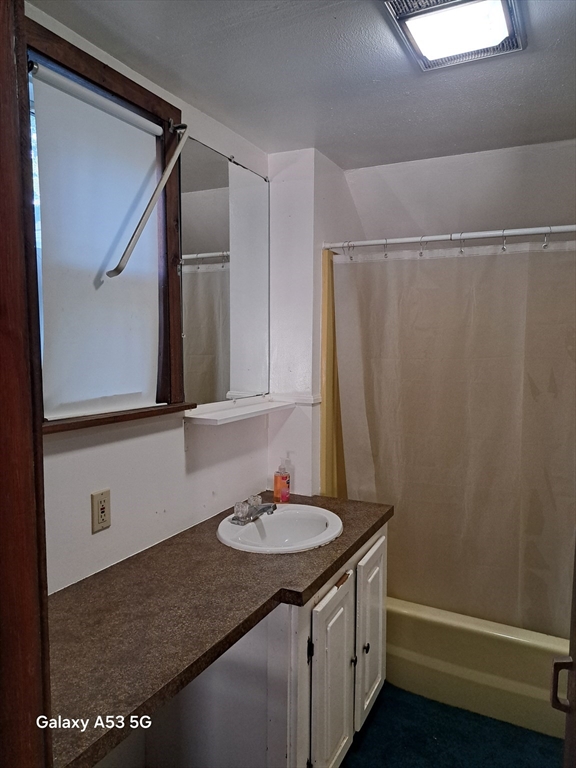 360 Hamilton Street Worcester, MA 01604 - Photo 24 of 35 a bathroom with a sink and a mirror