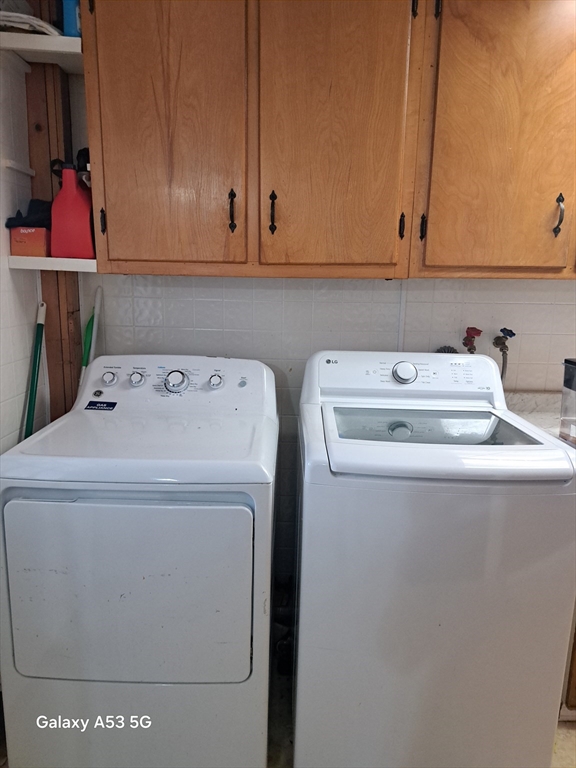 360 Hamilton Street Worcester, MA 01604 - Photo 34 of 35 a utility room with dryer and washer