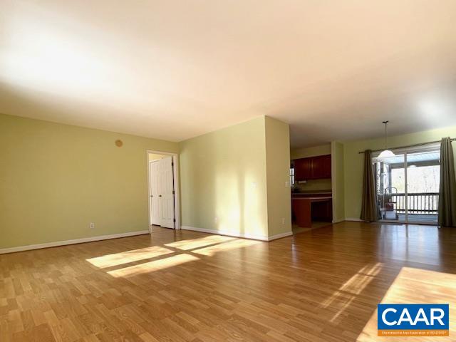 4785 Woodbound Road Keswick, VA 22947 - Photo 6 of 36 a view of a livingroom with wooden floor
