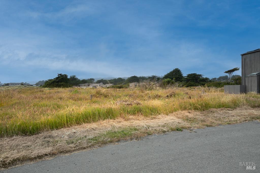 42080 Rock Cod The Sea Ranch, CA 95497 - Photo 2 of 15 a view of lake with mountain in background