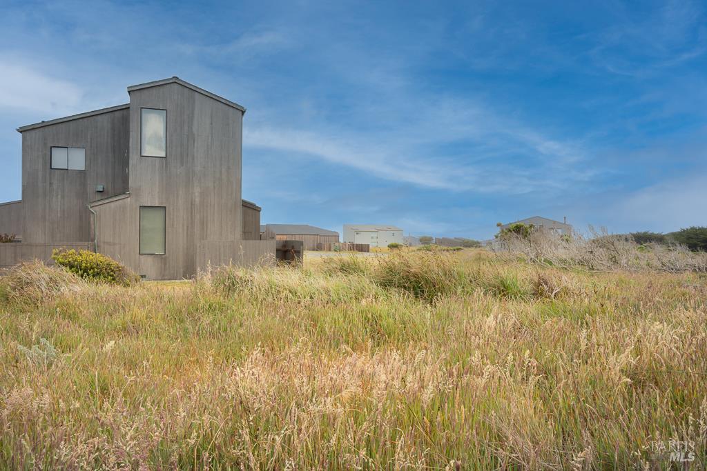42080 Rock Cod The Sea Ranch, CA 95497 - Photo 8 of 15 a view of a pathway of a building