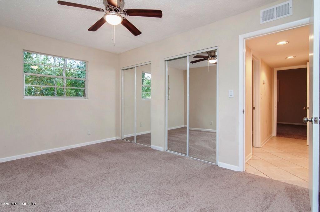 1944 Constant Drive Jacksonville, FL 32210 - Photo 14 of 21 a view of empty room with window and ceiling fan