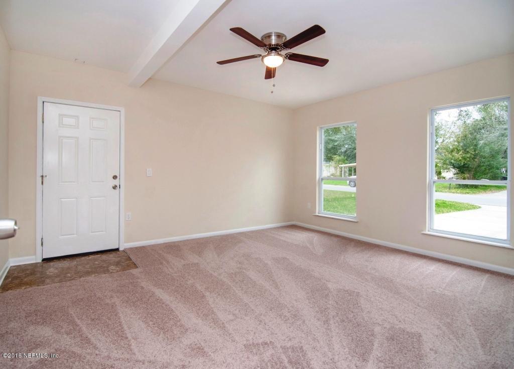 1944 Constant Drive Jacksonville, FL 32210 - Photo 15 of 21 a view of an empty room with a window