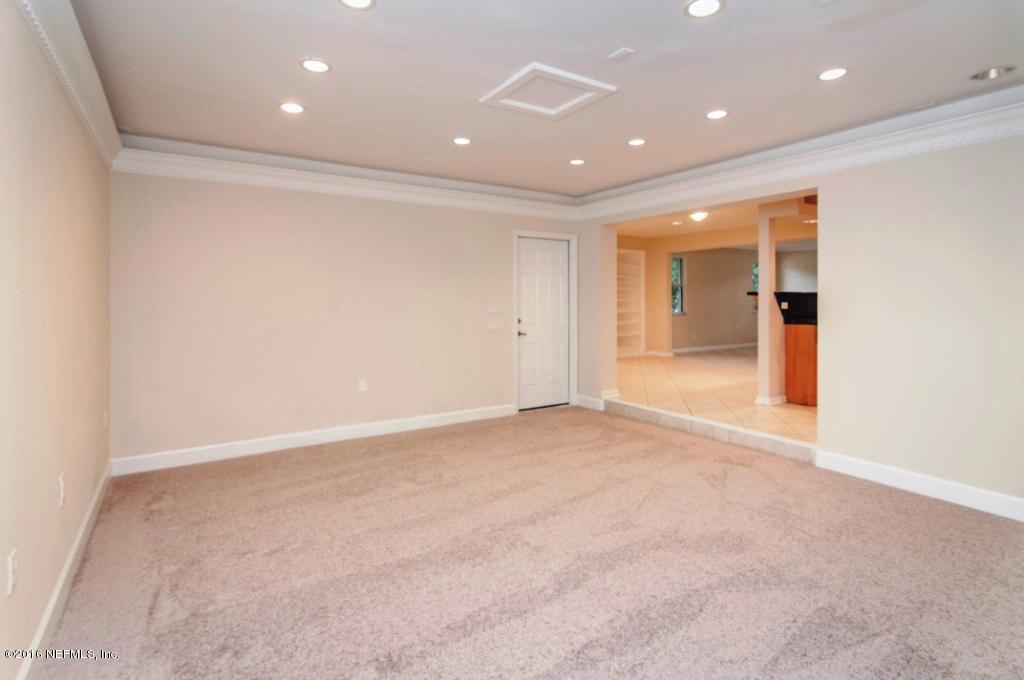 1944 Constant Drive Jacksonville, FL 32210 - Photo 7 of 21 an empty room with a natural light