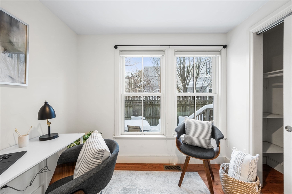 50 Spring Street Cambridge, MA 02141 - Photo 18 of 36 a living room with furniture and a window