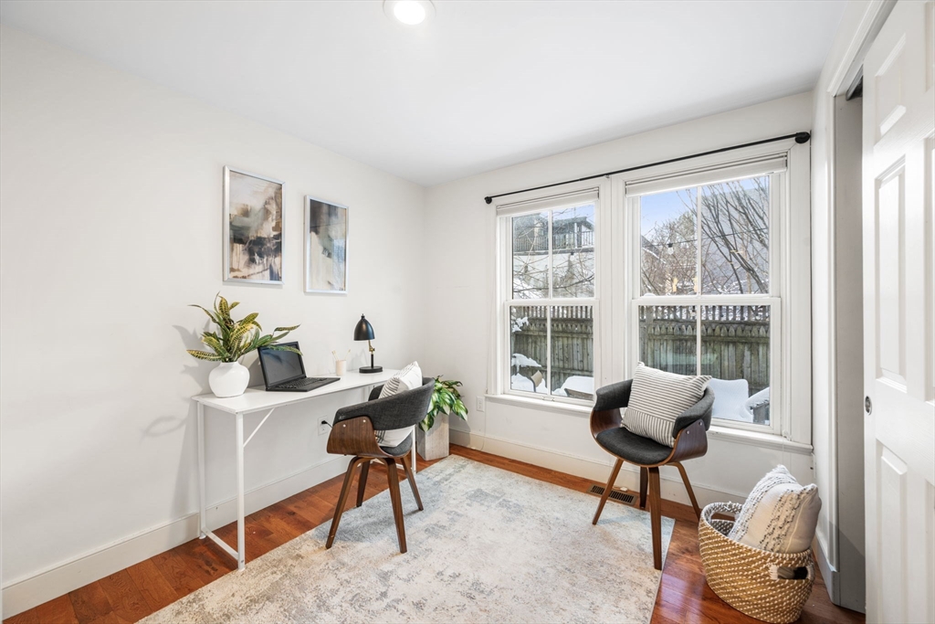 50 Spring Street Cambridge, MA 02141 - Photo 19 of 36 a work room with furniture and a potted plant