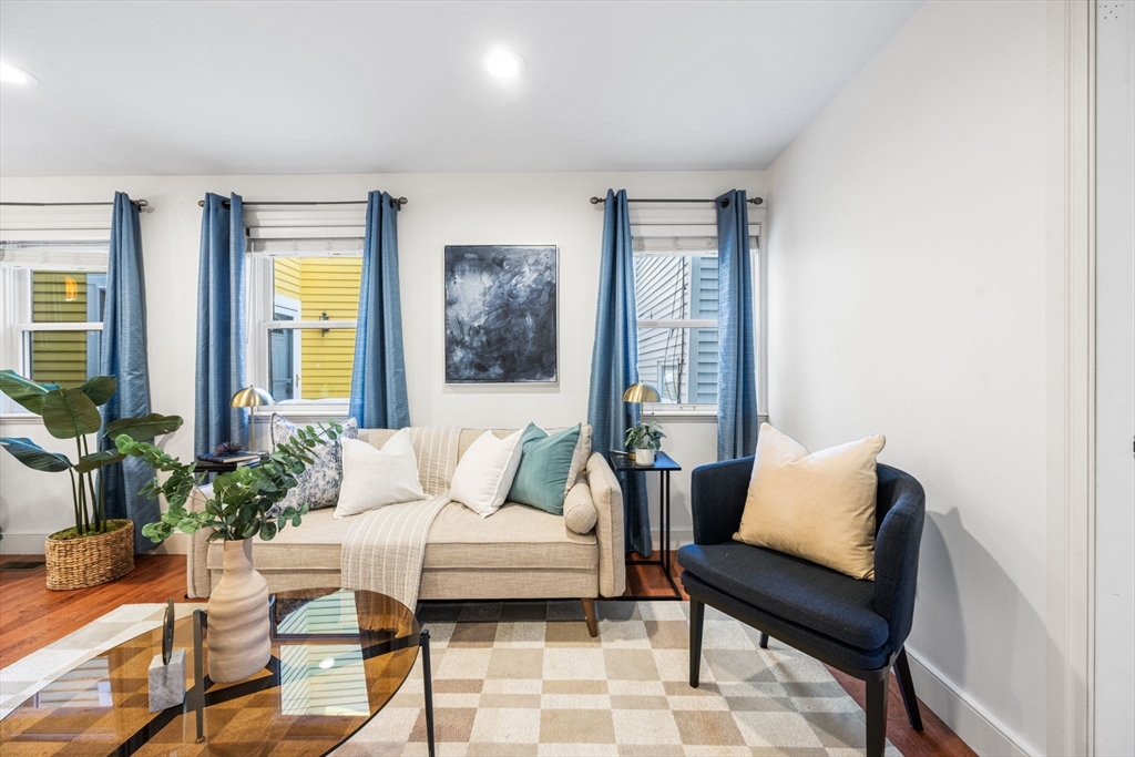 50 Spring Street Cambridge, MA 02141 - Photo 9 of 36 a living room with furniture and a potted plant