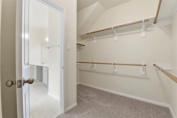 a view of a room with racks on the wall