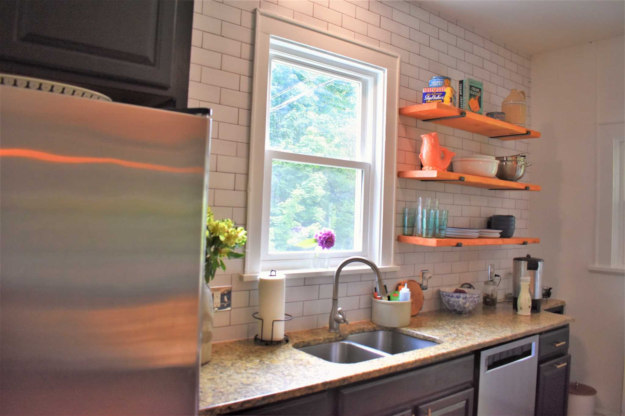 18 Overlook Road Poughkeepsie, NY 12603 - Photo 15 of 30 a kitchen with a sink a counter top space and cabinets