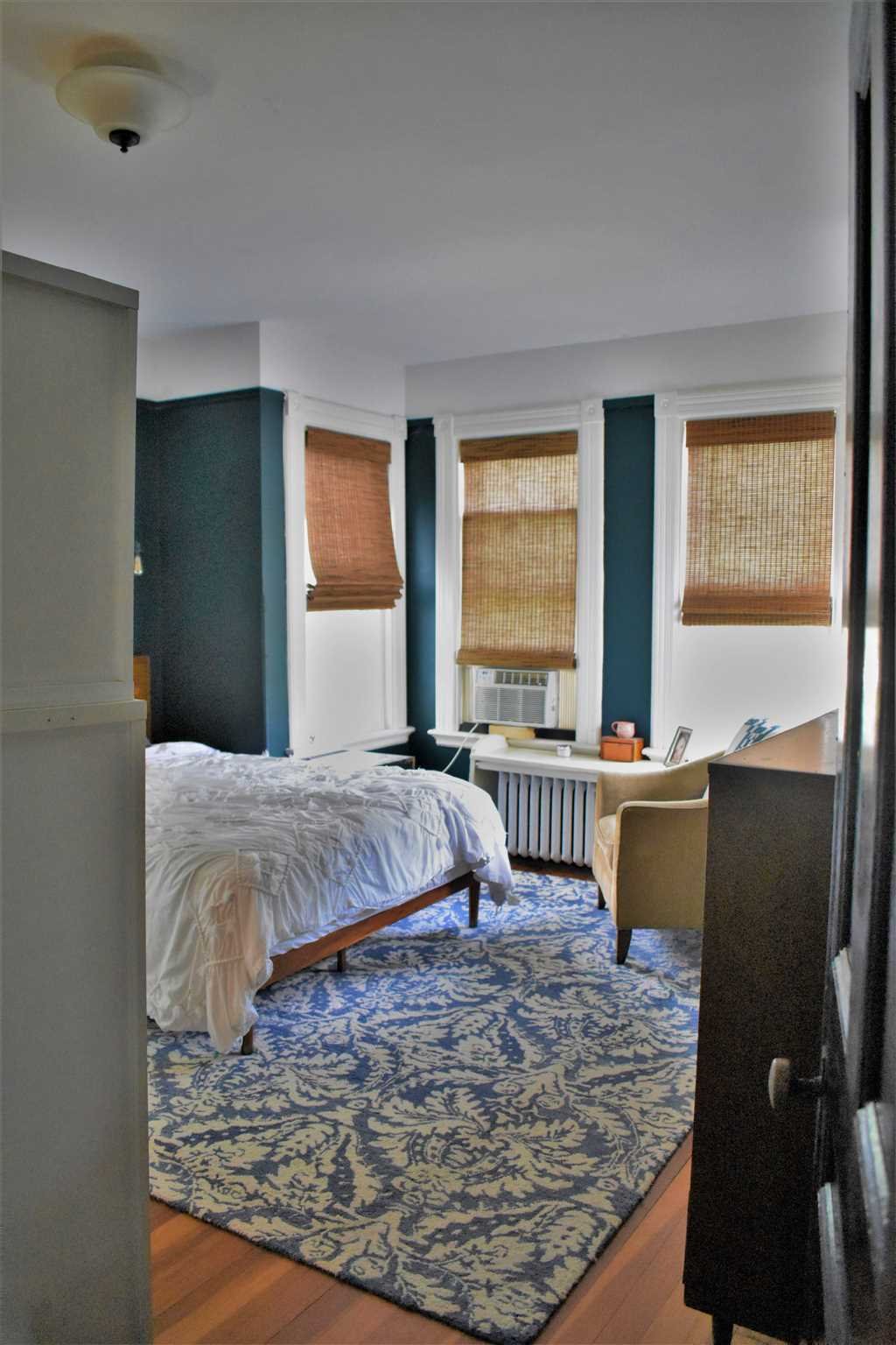 18 Overlook Road Poughkeepsie, NY 12603 - Photo 20 of 30 a bedroom with a bed window and a night stand