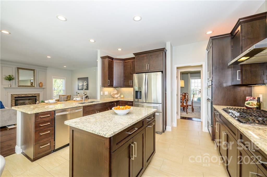 615 Circle Trace Road Monroe, NC 28110 - Photo 13 of 35 a kitchen with a stove sink and refrigerator