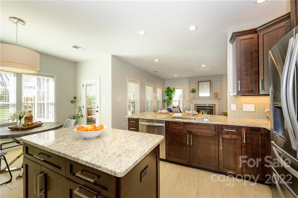 615 Circle Trace Road Monroe, NC 28110 - Photo 14 of 35 a kitchen with a sink a stove and cabinets