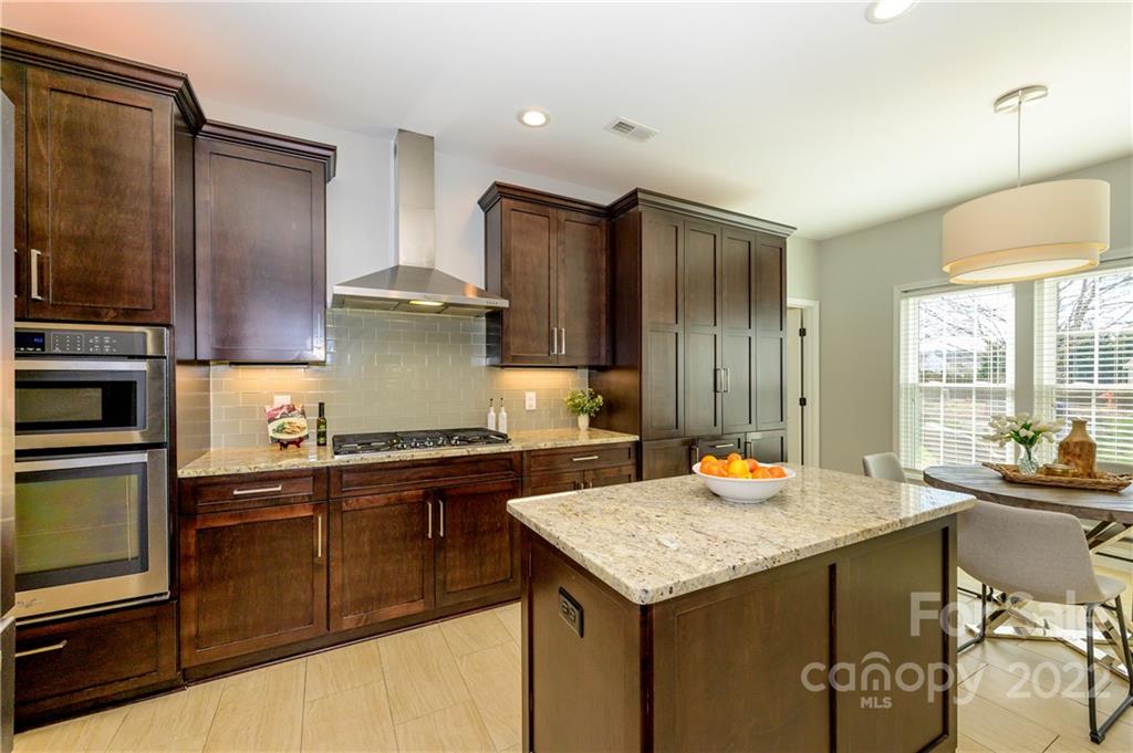 615 Circle Trace Road Monroe, NC 28110 - Photo 15 of 35 a kitchen with a sink stove and refrigerator
