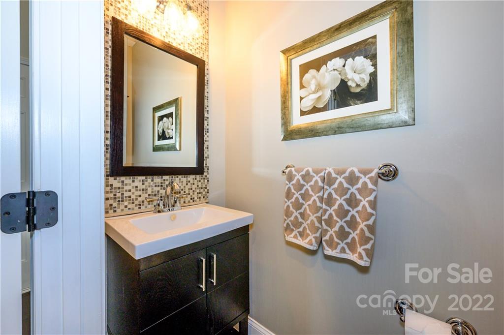 615 Circle Trace Road Monroe, NC 28110 - Photo 20 of 35 a bathroom with a sink and a mirror