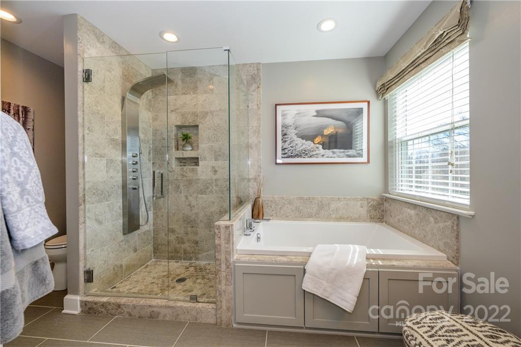 615 Circle Trace Road Monroe, NC 28110 - Photo 26 of 35 a bathroom with a bathtub and a shower
