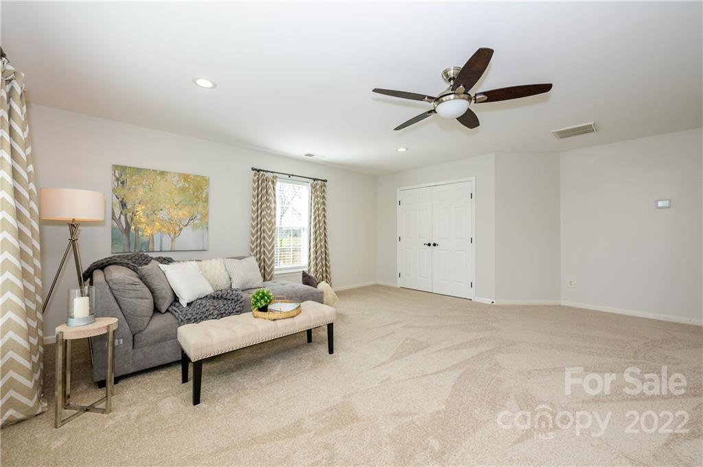 615 Circle Trace Road Monroe, NC 28110 - Photo 29 of 35 a living room with furniture and white walls