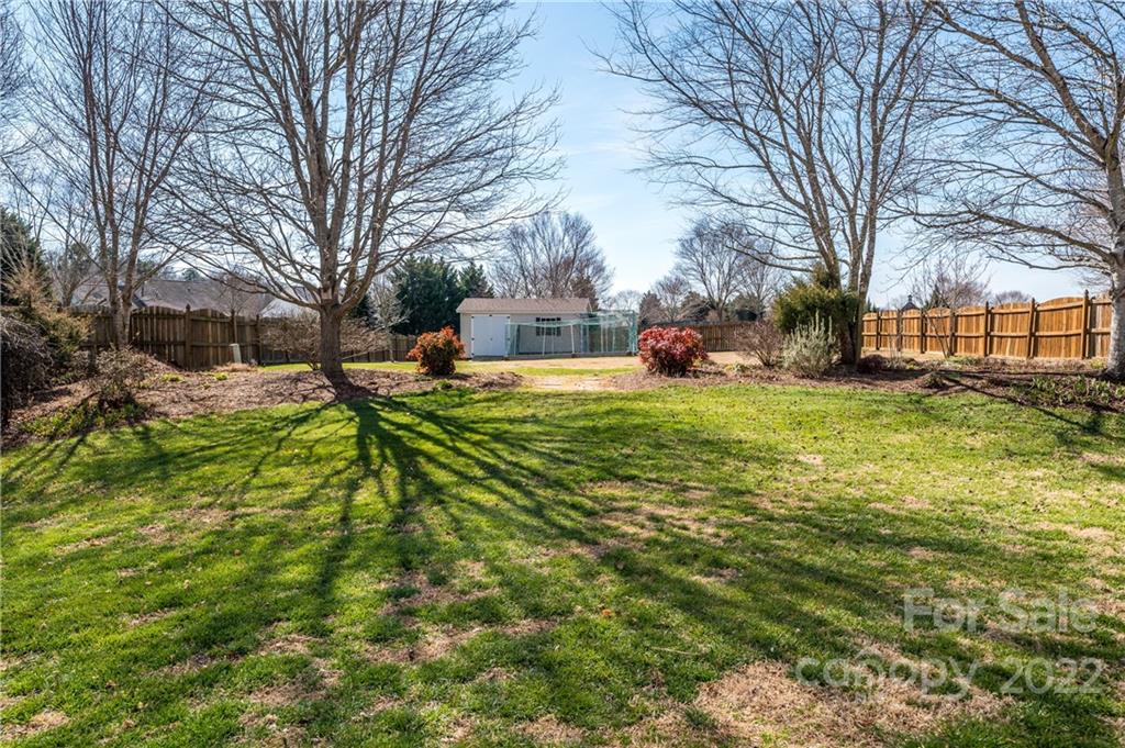 615 Circle Trace Road Monroe, NC 28110 - Photo 33 of 35 a view of a yard with a house in the background