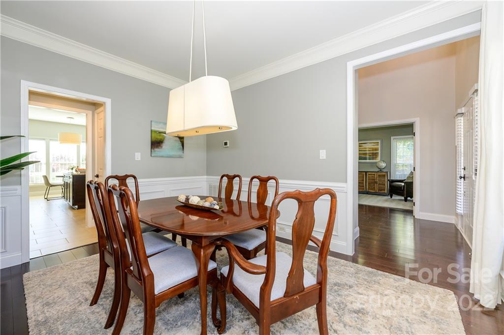 615 Circle Trace Road Monroe, NC 28110 - Photo 7 of 35 a dining room with furniture and a chandelier