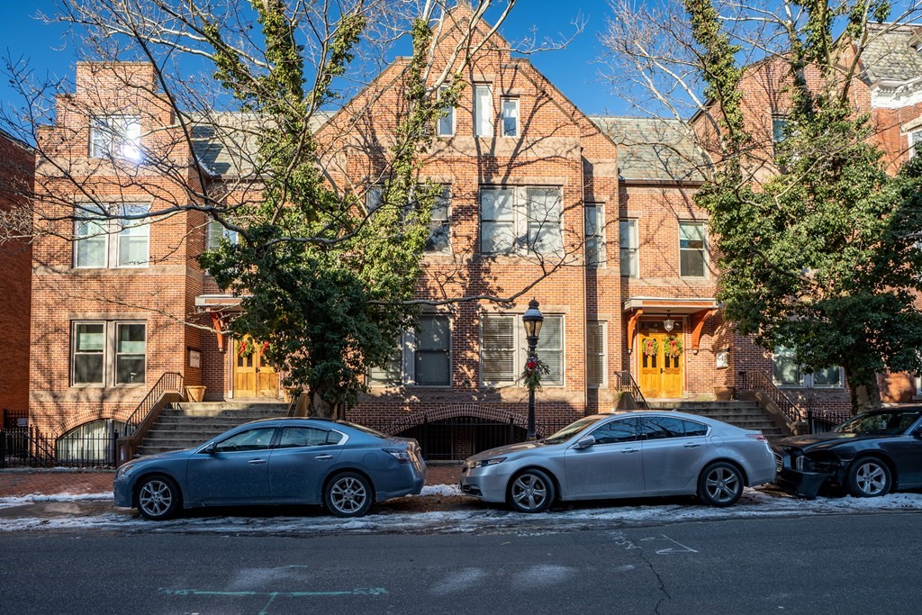 a car parked in front of a house
