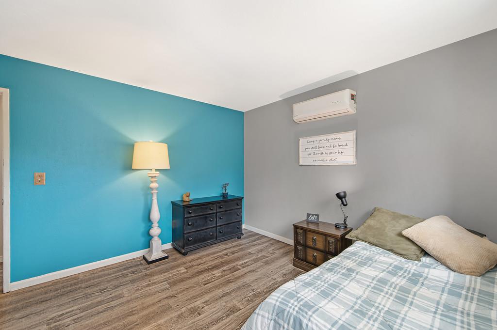 6689 Rhodes Avenue Placerville, CA 95667 - Photo 35 of 60 a bedroom with bed and wooden floor