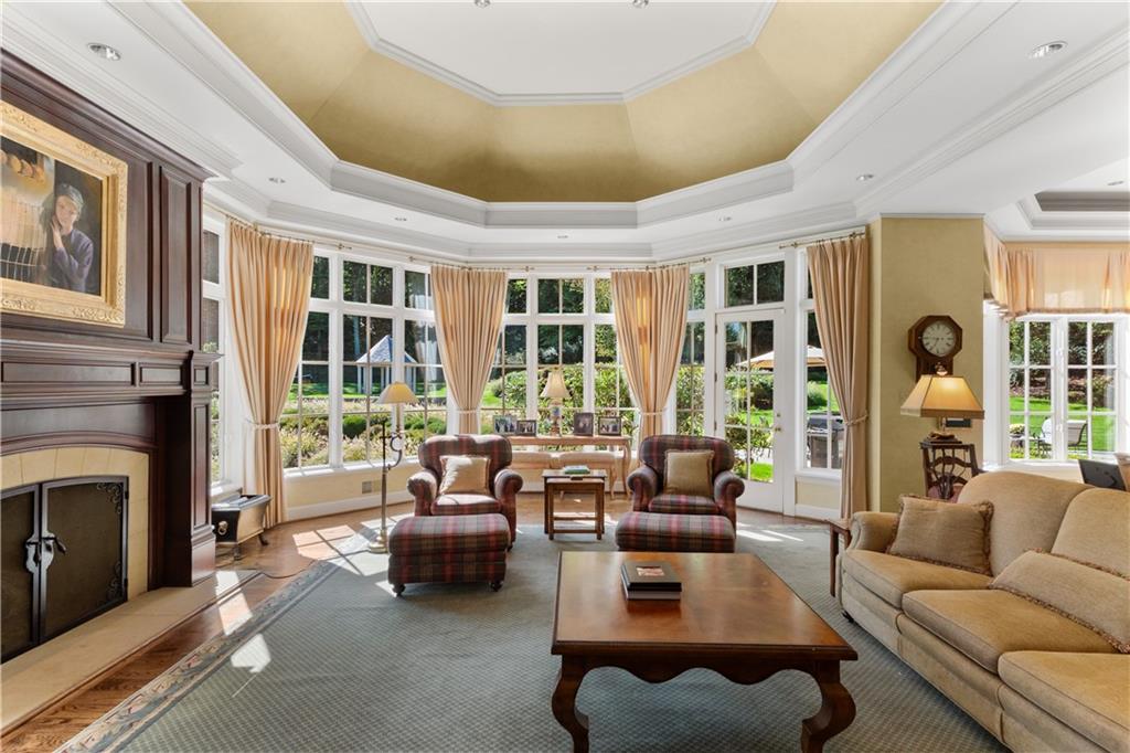 282 Justabout Road Venetia, PA 15367 - Photo 14 of 50 a living room with furniture and a fireplace