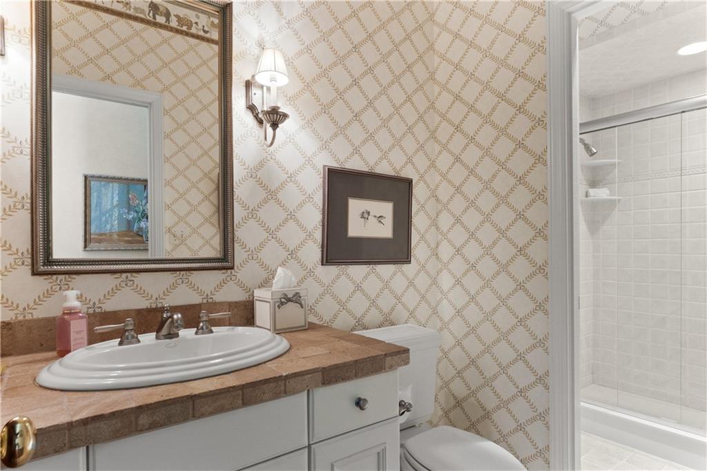 282 Justabout Road Venetia, PA 15367 - Photo 24 of 50 a bathroom with a granite countertop sink and a mirror