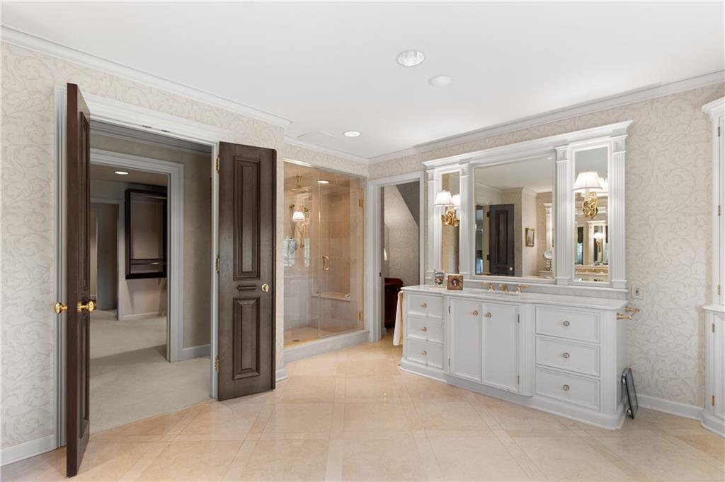 282 Justabout Road Venetia, PA 15367 - Photo 28 of 50 a large en suite bathroom with a mirror sink and shower