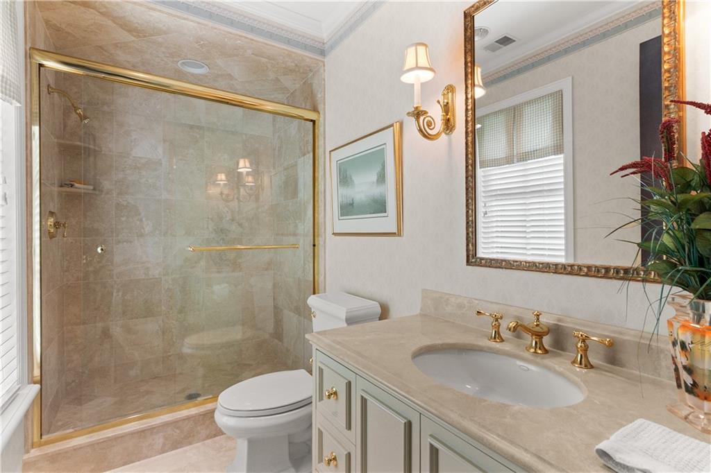 282 Justabout Road Venetia, PA 15367 - Photo 34 of 50 a bathroom with a granite countertop sink a toilet a mirror and shower