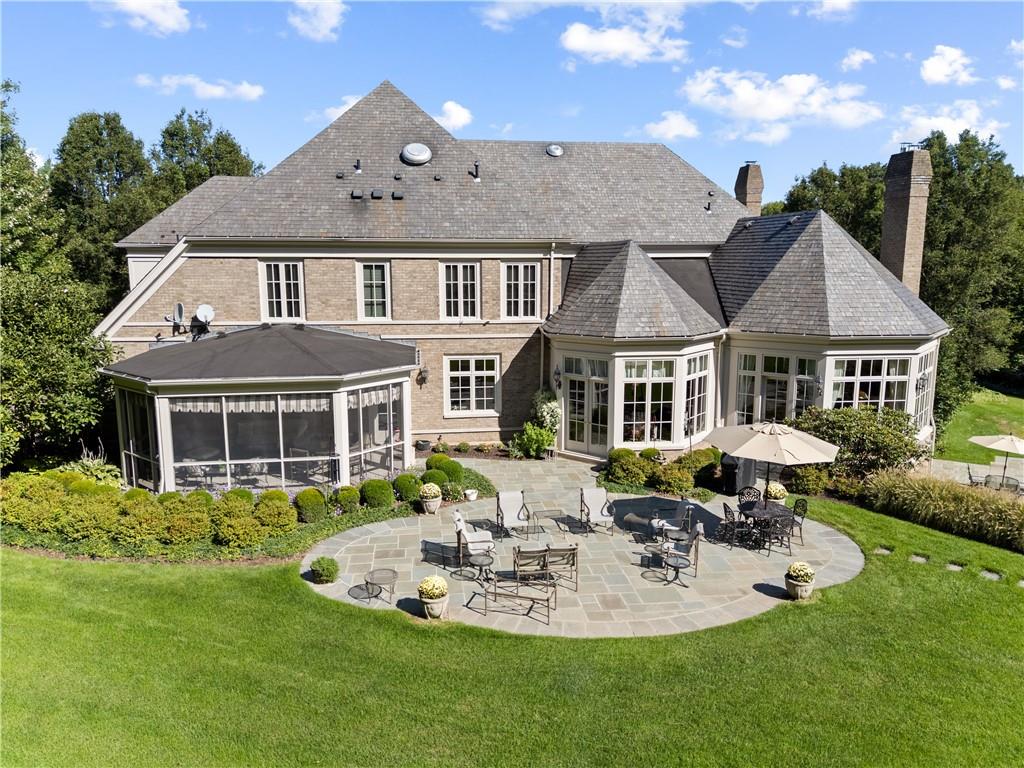282 Justabout Road Venetia, PA 15367 - Photo 4 of 50 a front view of a house with a yard table and chairs