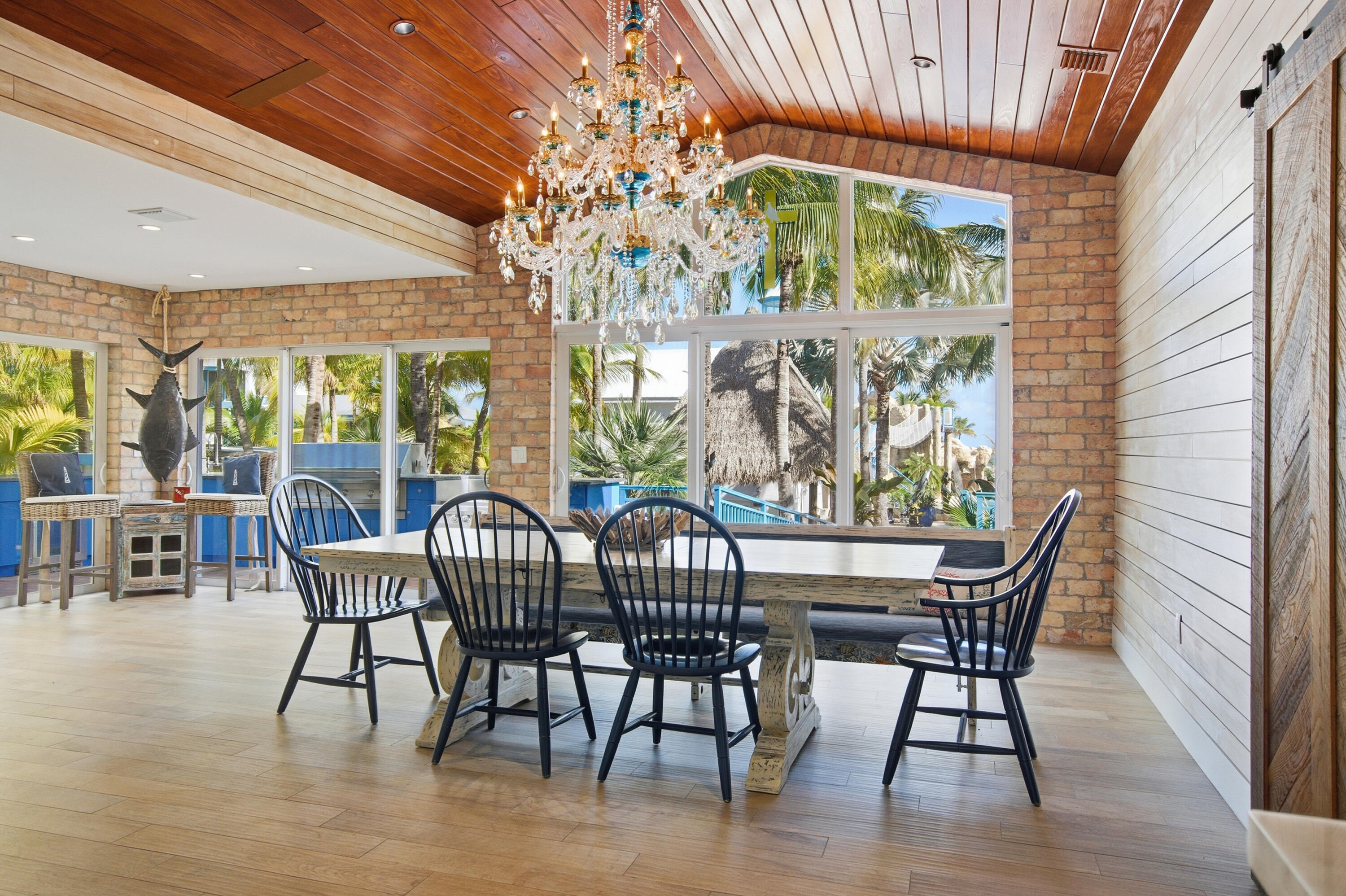 101 Oleander Circle Key Largo, FL 33037 - Photo 15 of 126 a view of a dining room with furniture window and outside view