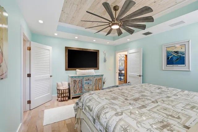 a kitchen with stainless steel appliances granite countertop a stove a refrigerator and a cabinets