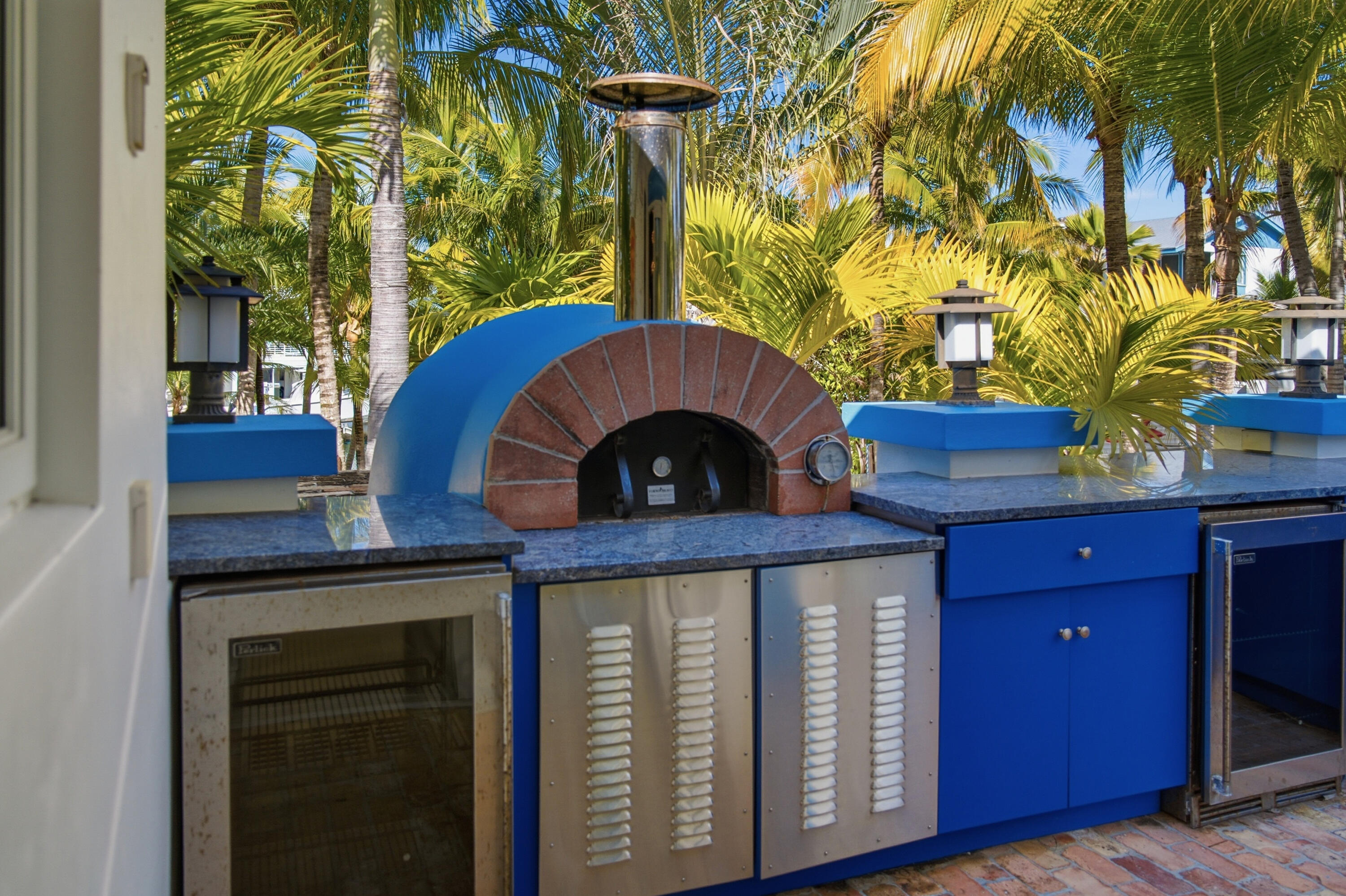 101 Oleander Circle Key Largo, FL 33037 - Photo 36 of 126 a front view of a house with yard and tree