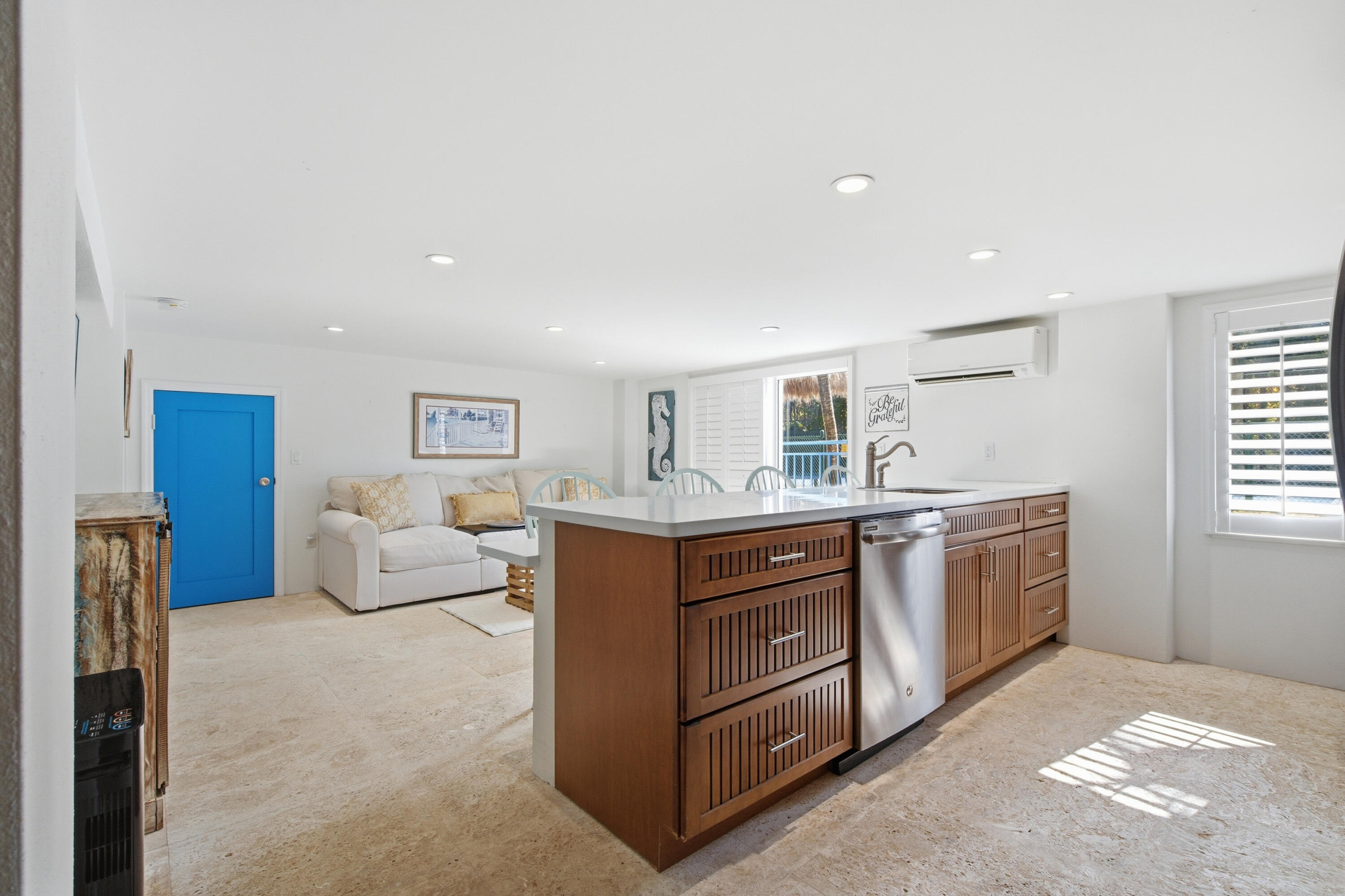 101 Oleander Circle Key Largo, FL 33037 - Photo 49 of 126 a kitchen with stainless steel appliances granite countertop a stove and a sink