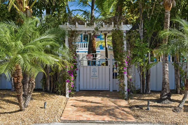 a large kitchen with stainless steel appliances kitchen island granite countertop a large counter top and stove