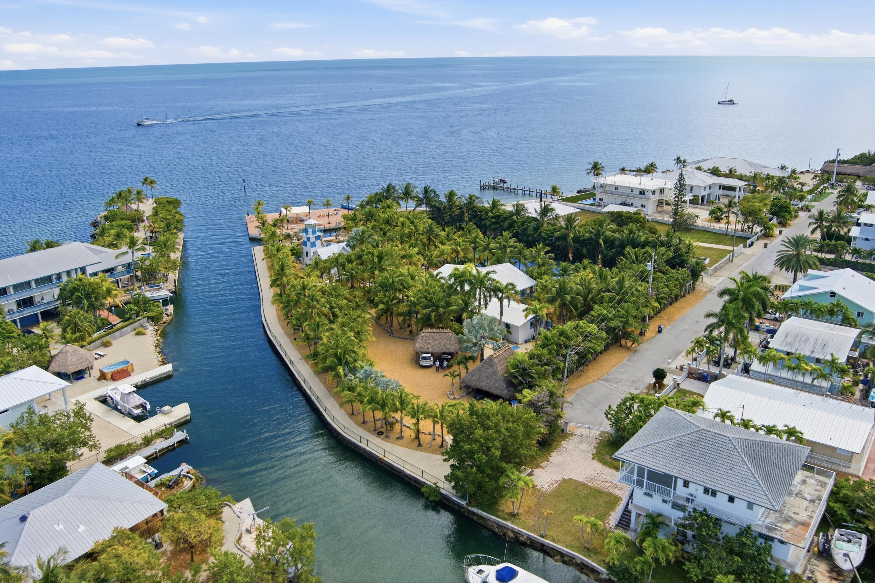 101 Oleander Circle Key Largo, FL 33037 - Photo 78 of 126 an aerial view of a house a yard with plants