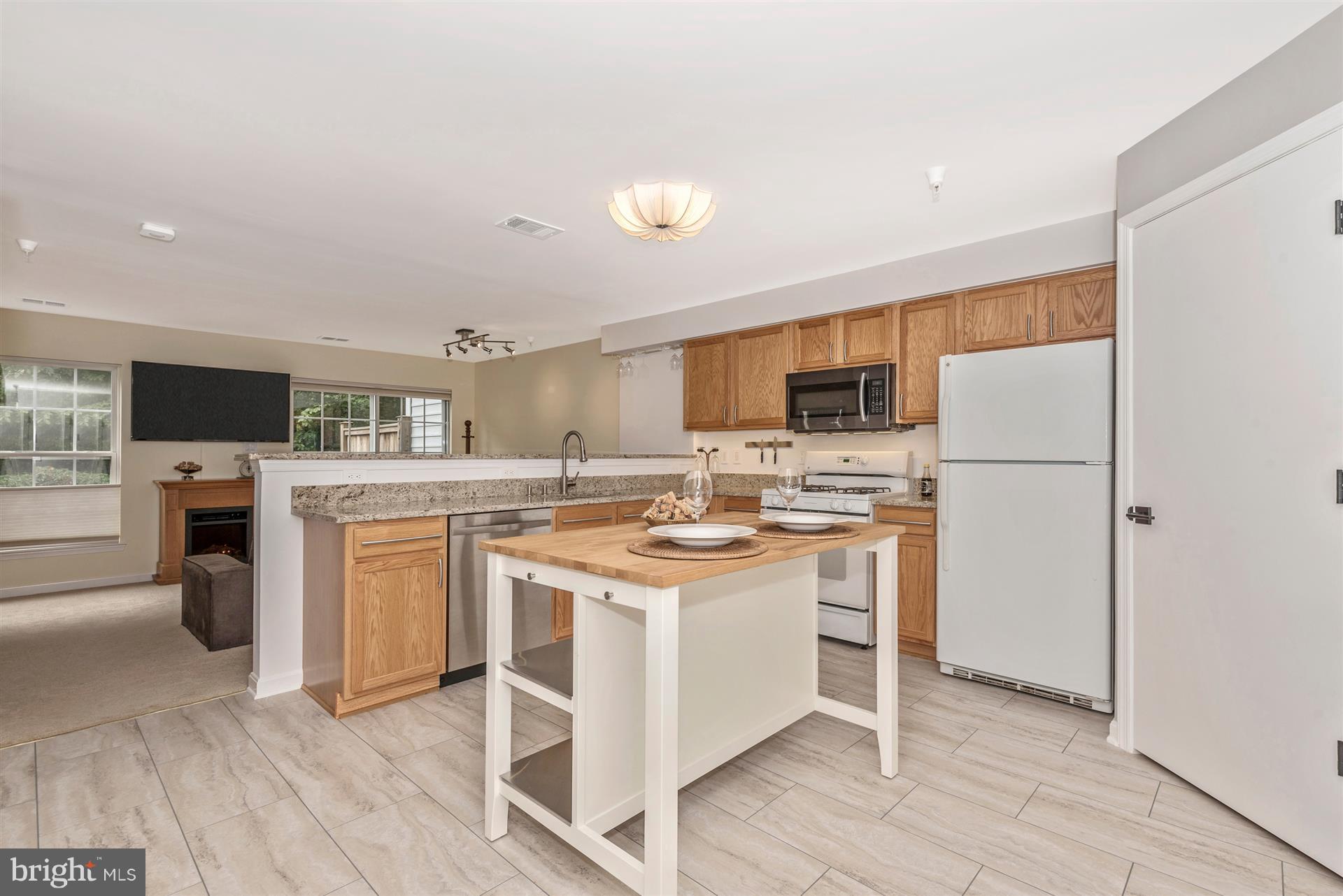 13974 Lullaby Road, Unit 3 Germantown, MD 20874 - Photo 14 of 28 Kitchen with island