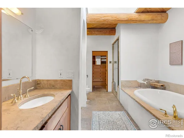 a bathroom with a sink and a tub