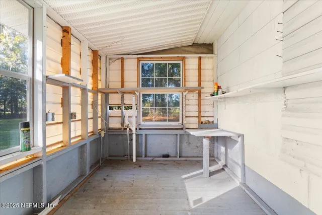 a room with furniture and windows