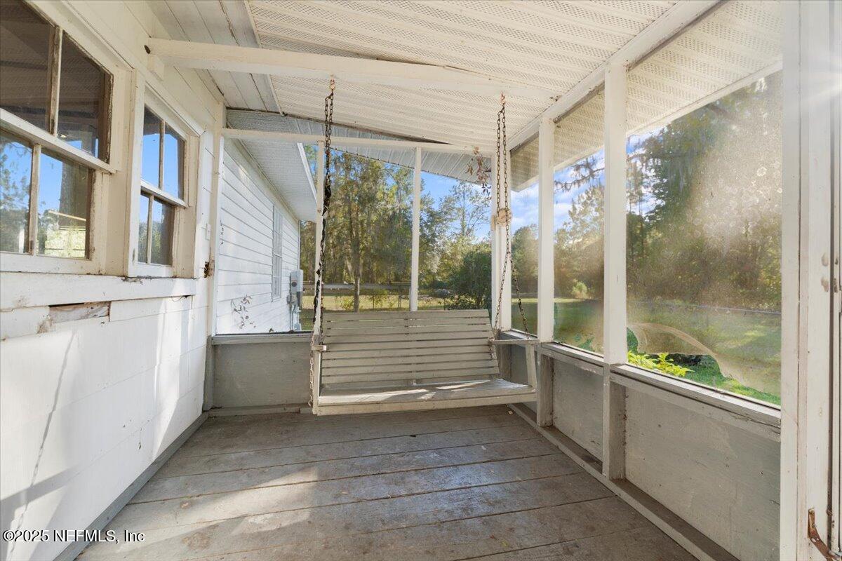 478 Harris Road Lake City, FL 32055 - Photo 30 of 43 a view of a balcony with door