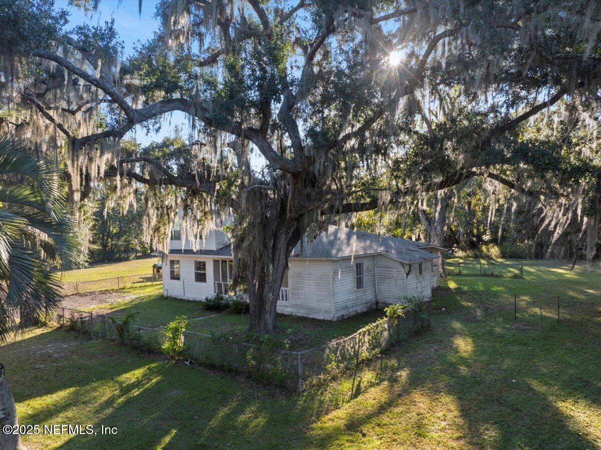 478 Harris Road Lake City, FL 32055 - Photo 3 of 43 a view of a yard with large trees
