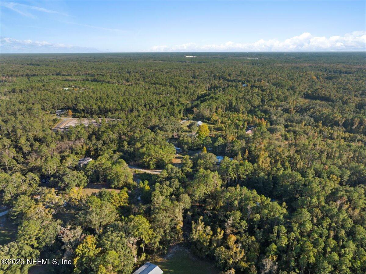 478 Harris Road Lake City, FL 32055 - Photo 36 of 43 a view of a city with lush green forest