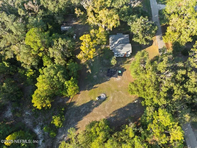 a view of a lake with lots of trees