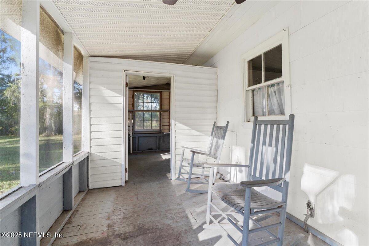 478 Harris Road Lake City, FL 32055 - Photo 5 of 43 a view of an entryway with wooden floor