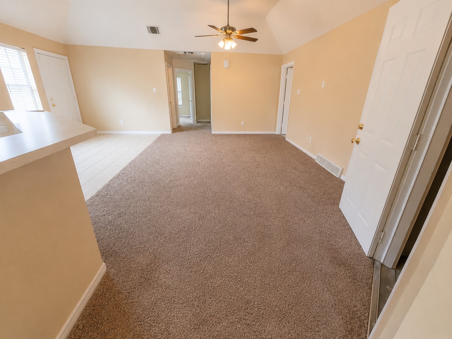 12926 Abalone Way Houston, TX 77044 - Photo 3 of 15 wooden floor in an empty room with a window