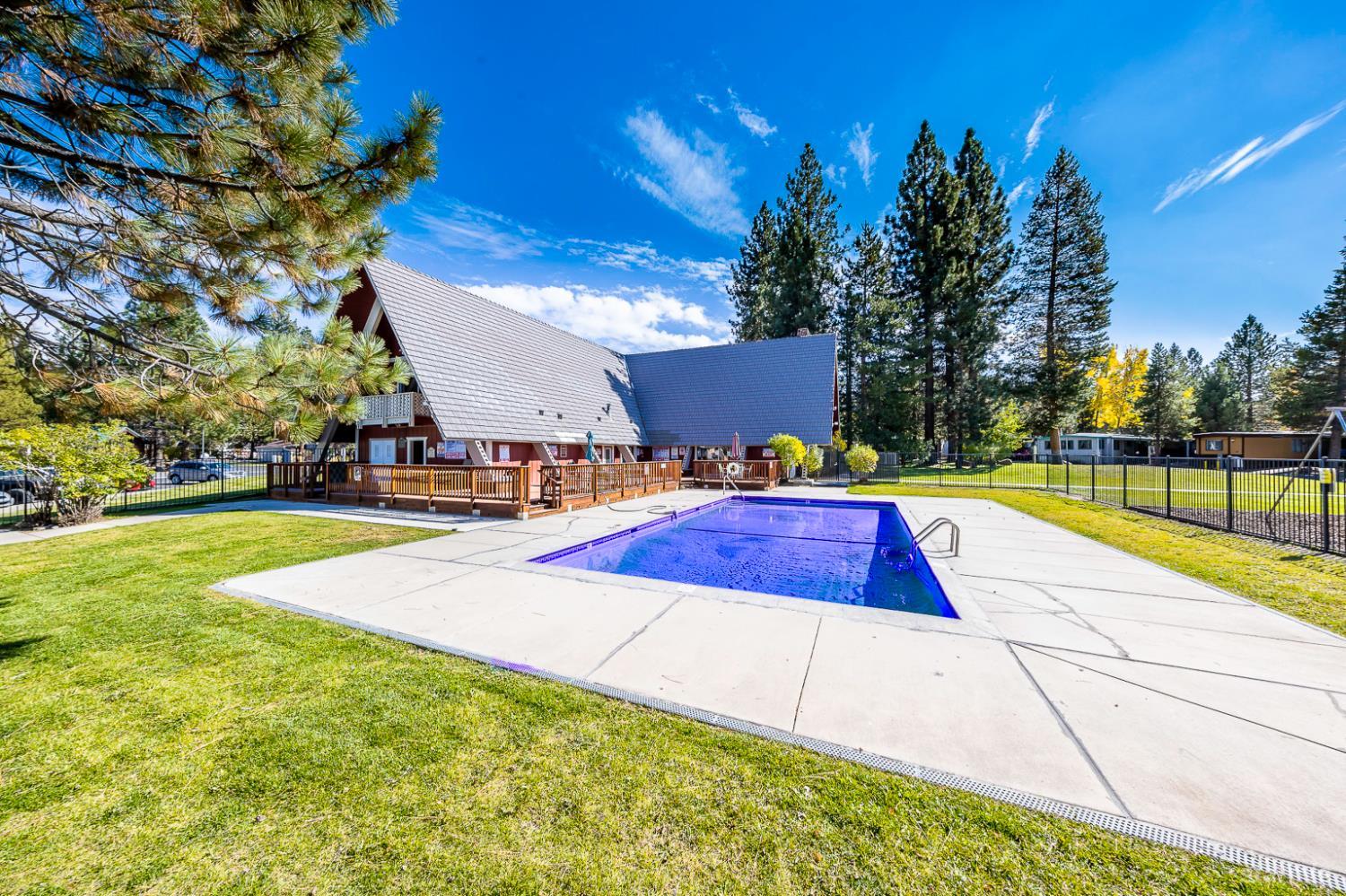 1080 Julie Lane, Unit 140 South Lake Tahoe, CA 96150 - Photo 18 of 20 a view of an outdoor space and swimming pool