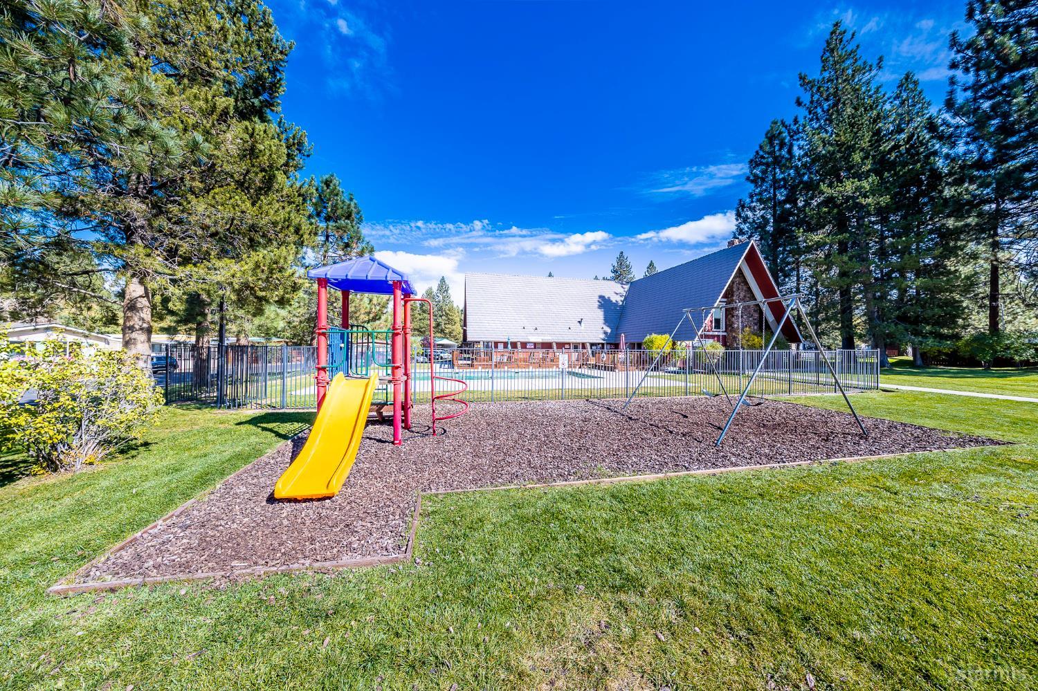 1080 Julie Lane, Unit 140 South Lake Tahoe, CA 96150 - Photo 20 of 20 a view of a park with swings and slides